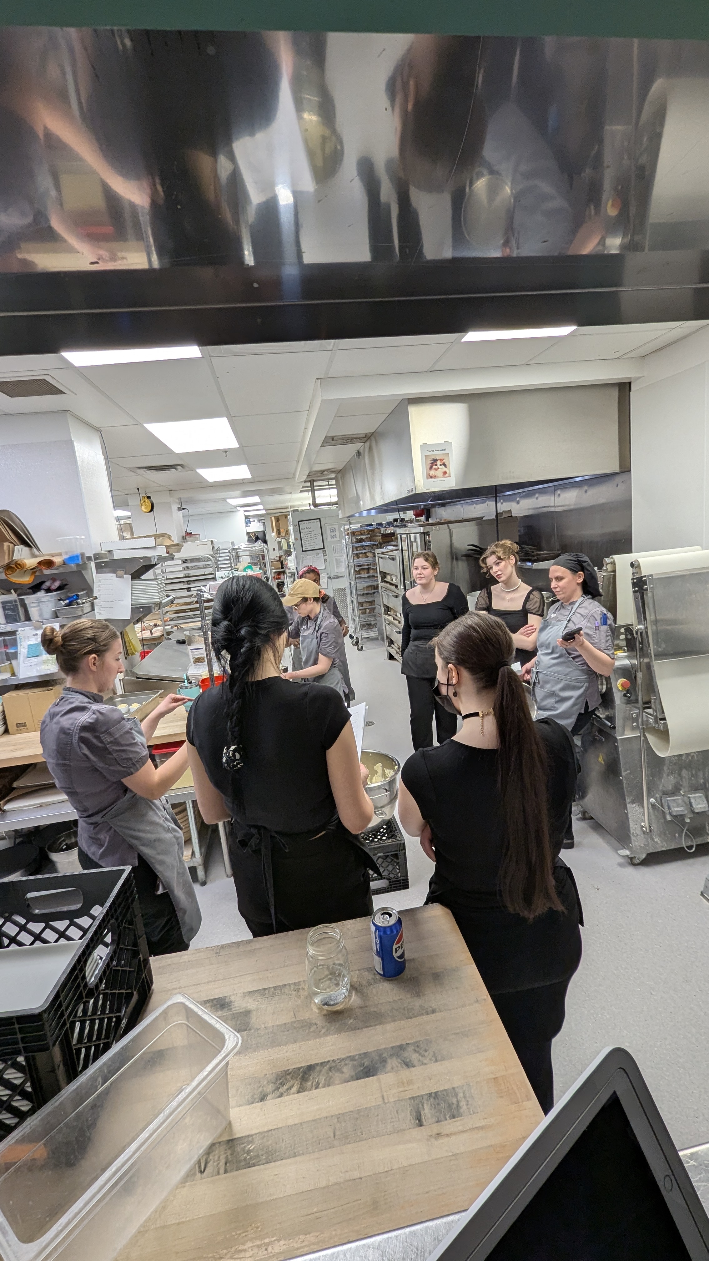 Chez Angela staff preparing for an intimate After Hours service.